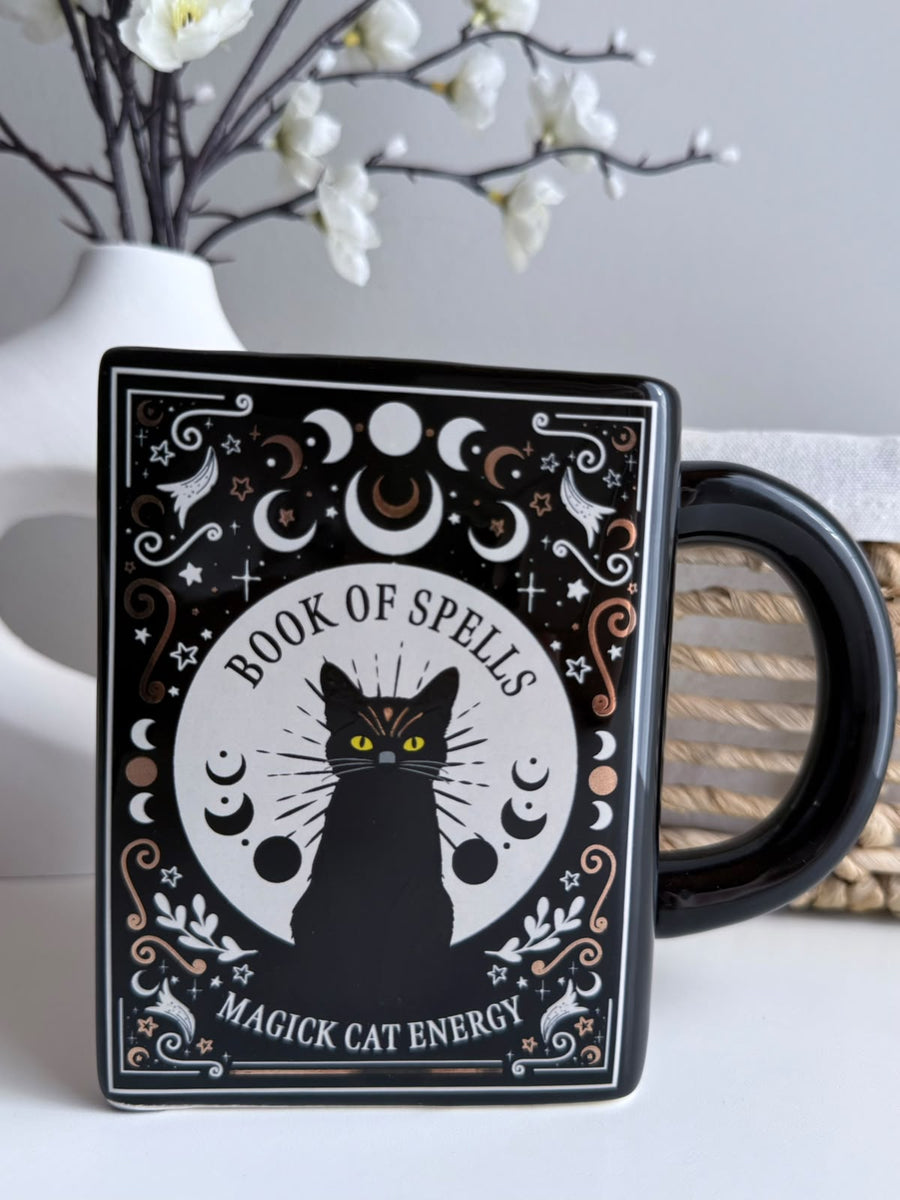 Taza El Libro de Hechizos de Migas · Taza con forma de libro